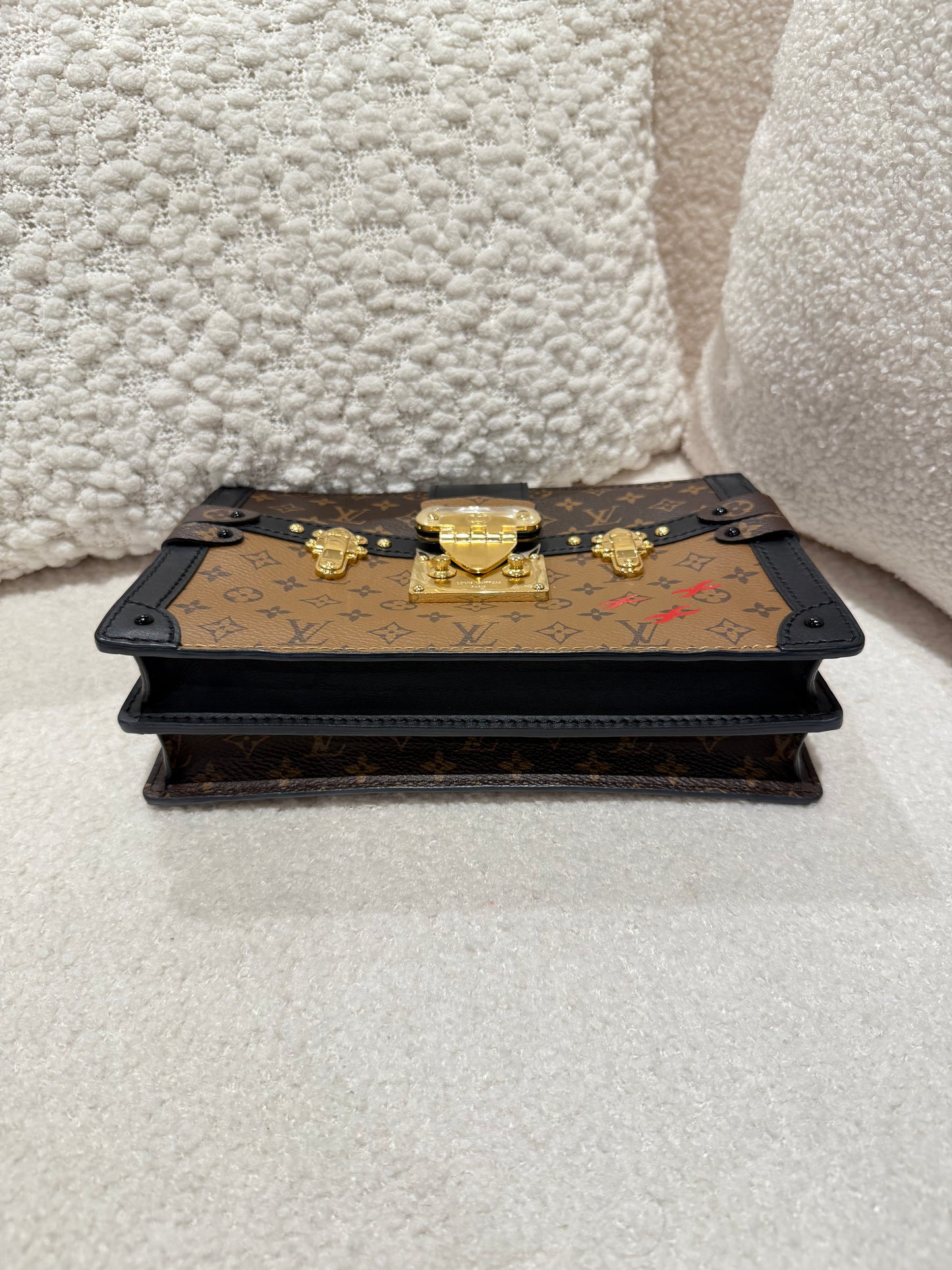 LOUIS VUITTON TRUNK CLUTCH REVERSE MONOGRAM