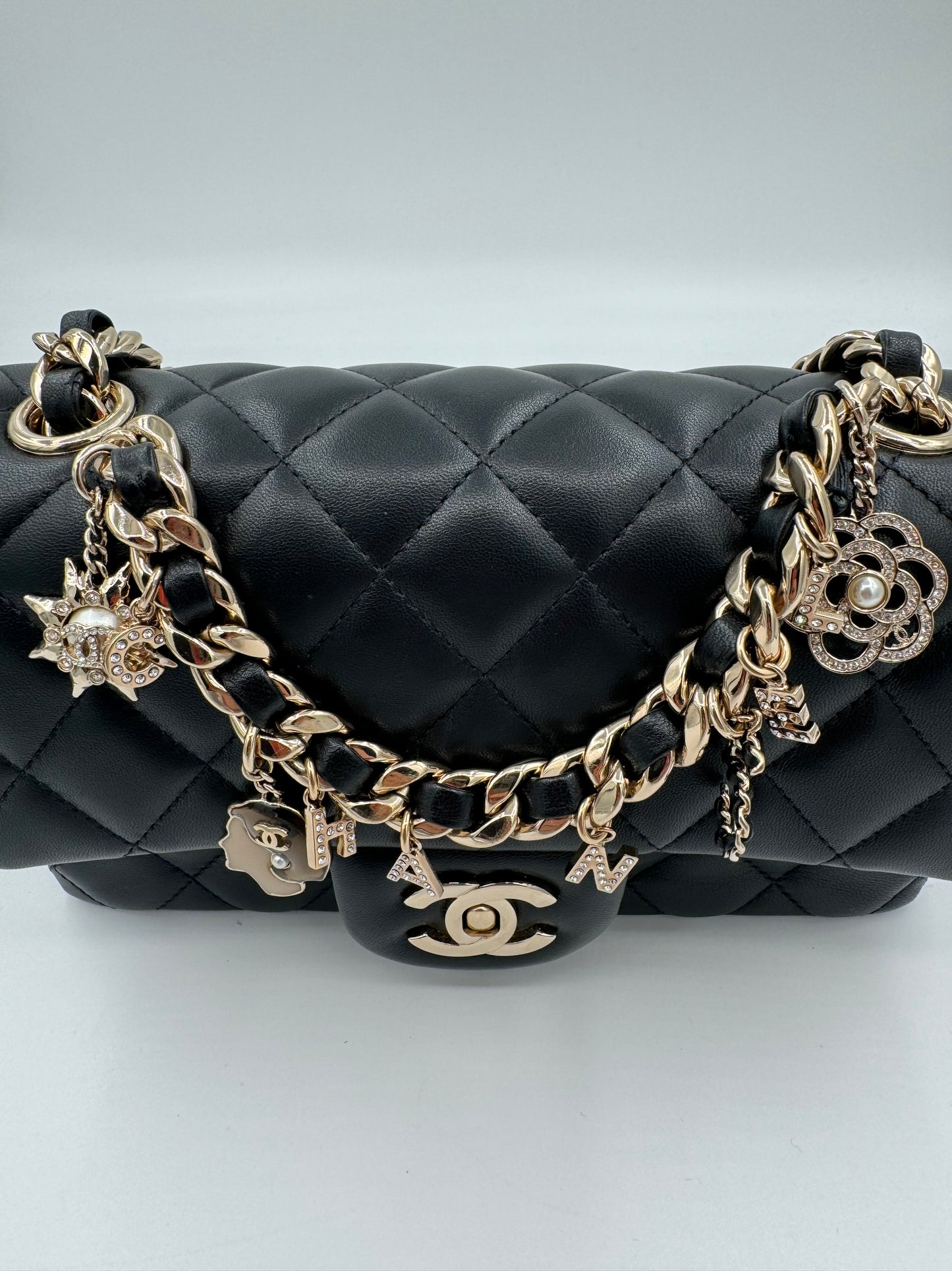 CHANEL Black Quilted Lambskin Mini Rectangular Coco Charms Flap Bag