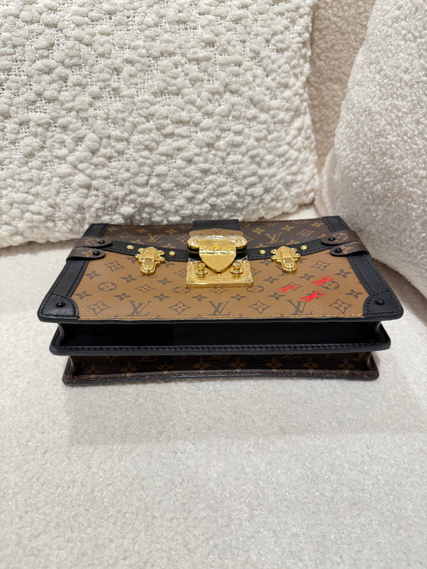 LOUIS VUITTON TRUNK CLUTCH REVERSE MONOGRAM