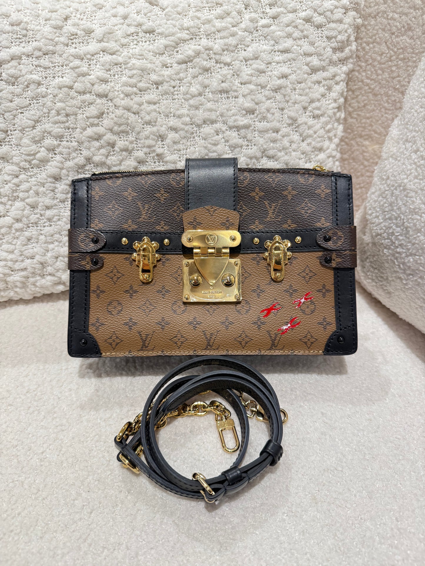 LOUIS VUITTON TRUNK CLUTCH REVERSE MONOGRAM