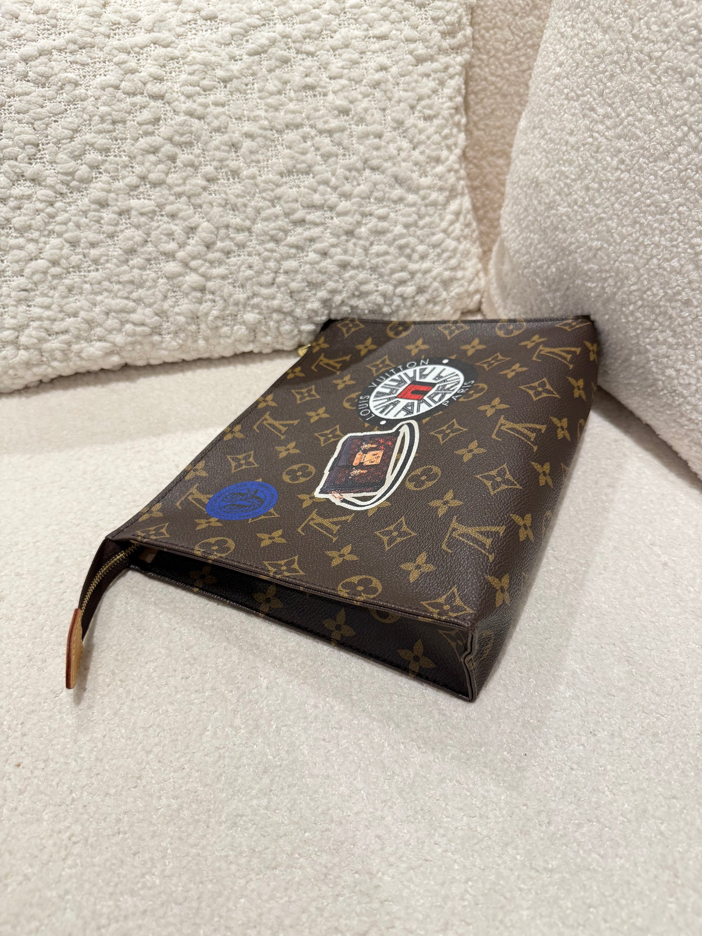 LOUIS VUITTON LIMITED BADGE POCHETTE VOYAGE MM