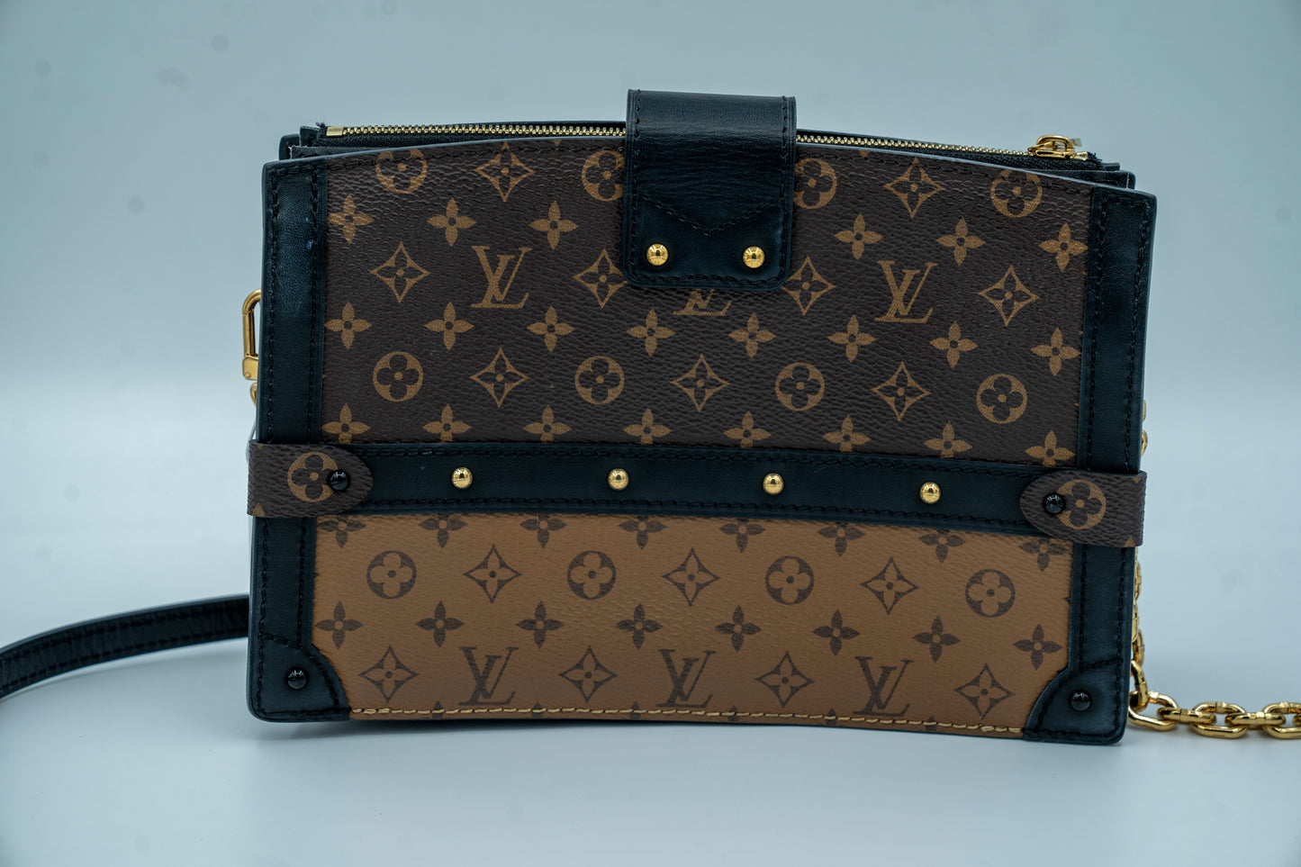 LOUIS VUITTON TRUNK CLUTCH REVERSE MONOGRAM