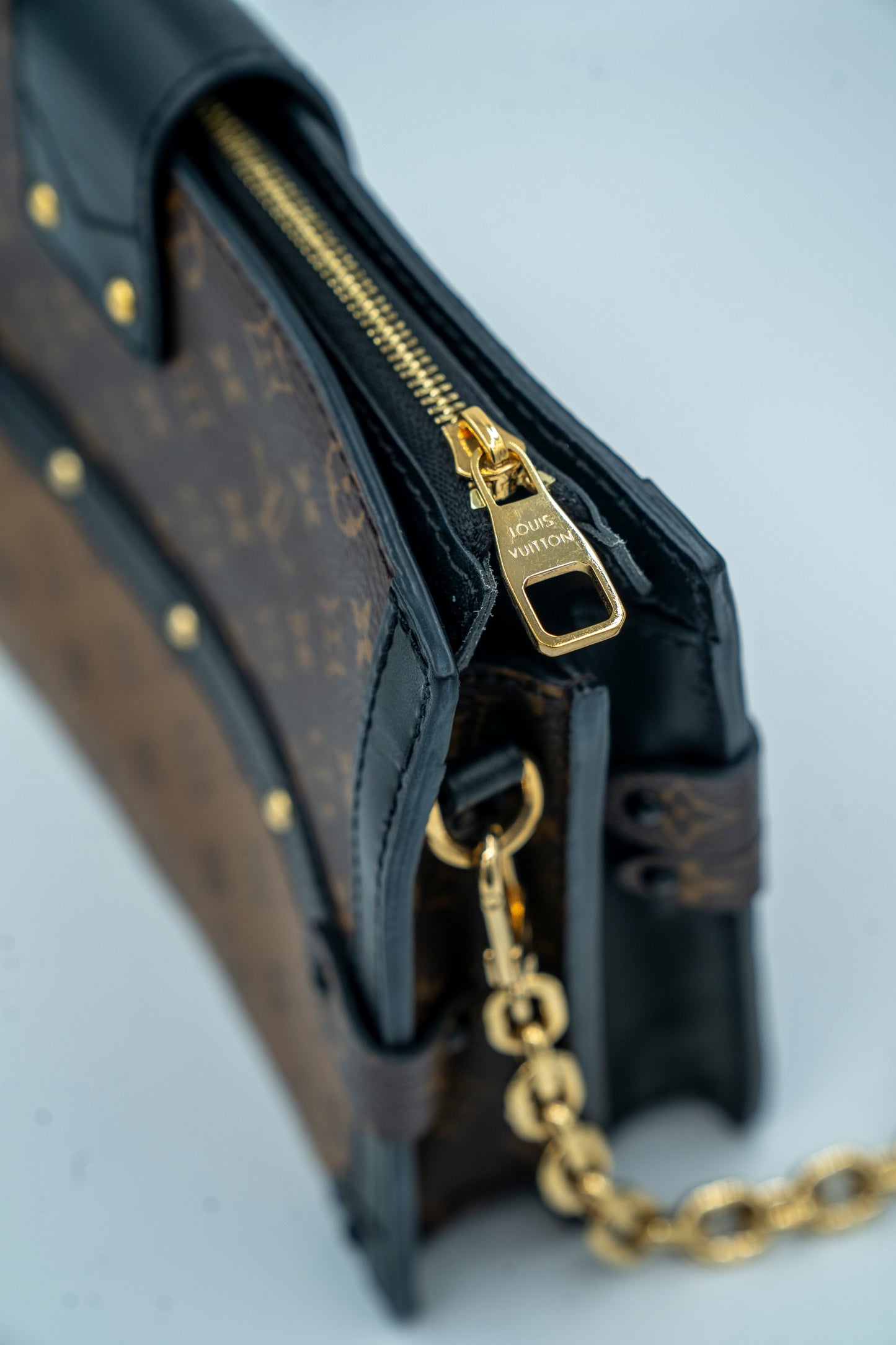 LOUIS VUITTON TRUNK CLUTCH REVERSE MONOGRAM