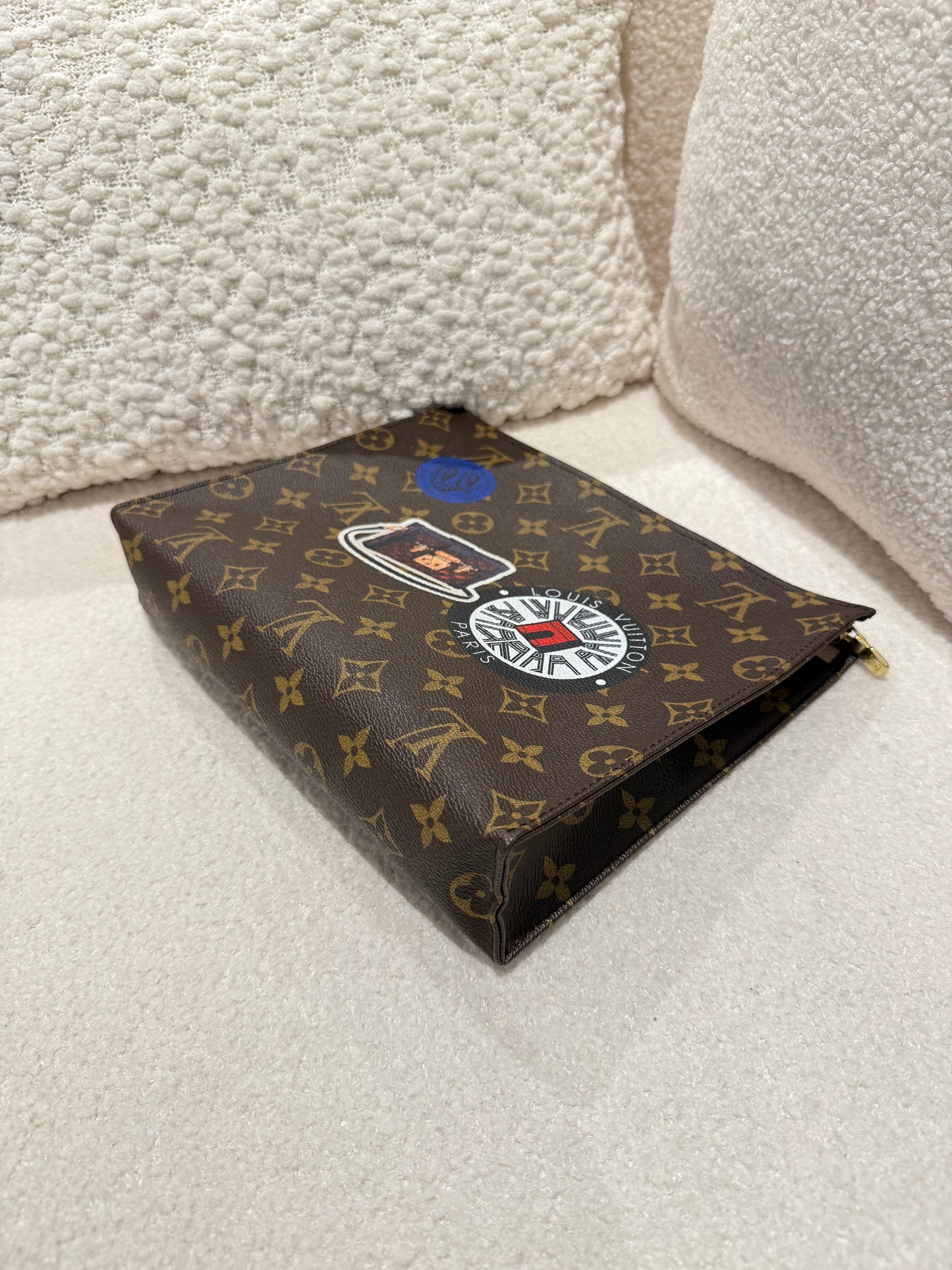 LOUIS VUITTON LIMITED BADGE POCHETTE VOYAGE MM