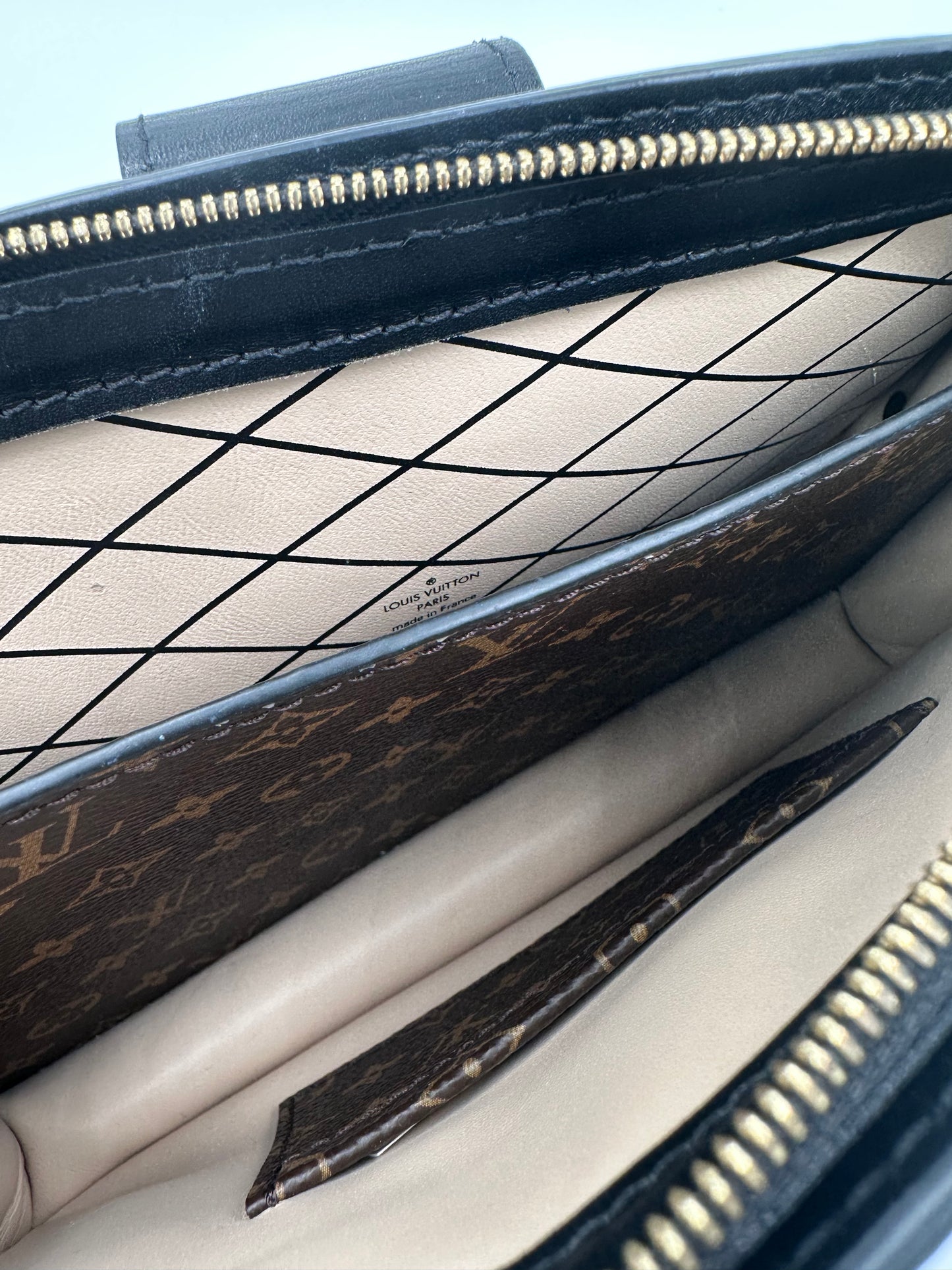 LOUIS VUITTON TRUNK CLUTCH REVERSE MONOGRAM