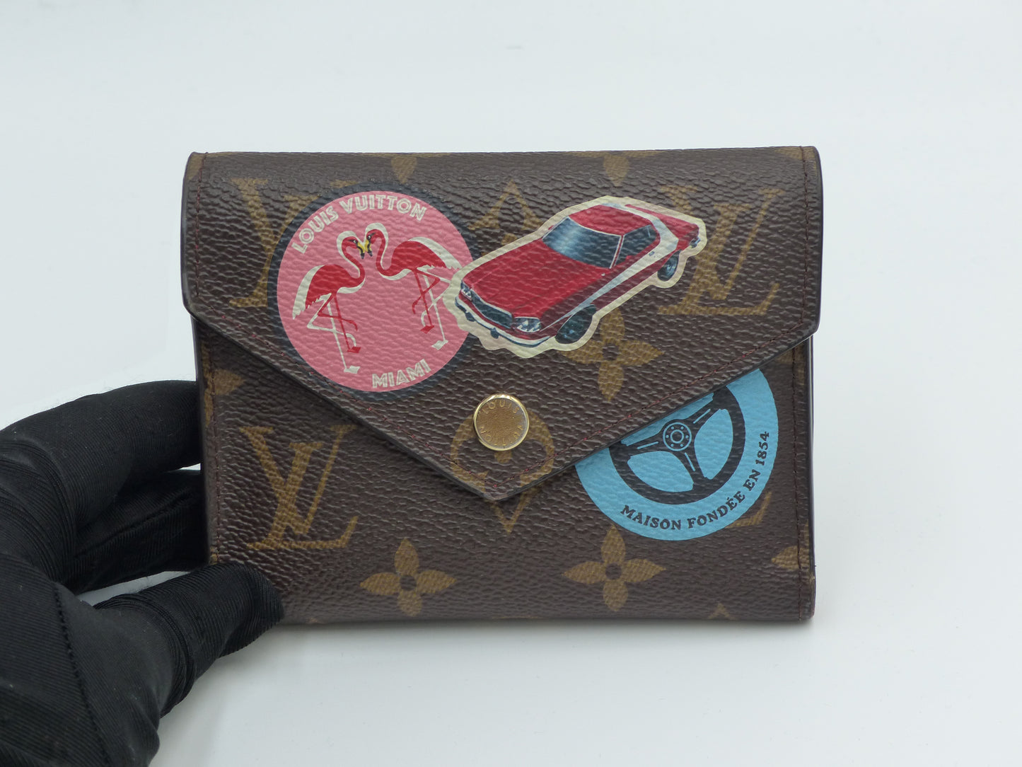 LOUIS VUITTON LIMITED BADGE WALLET